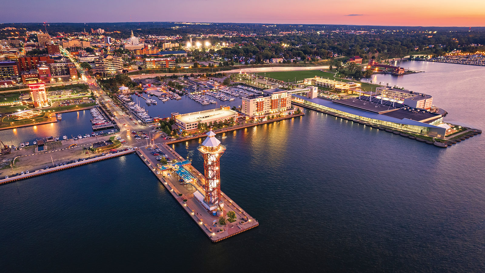 Aerial view of Erie, Pennsylvania bayfront and Bicentennial Tower at dusk